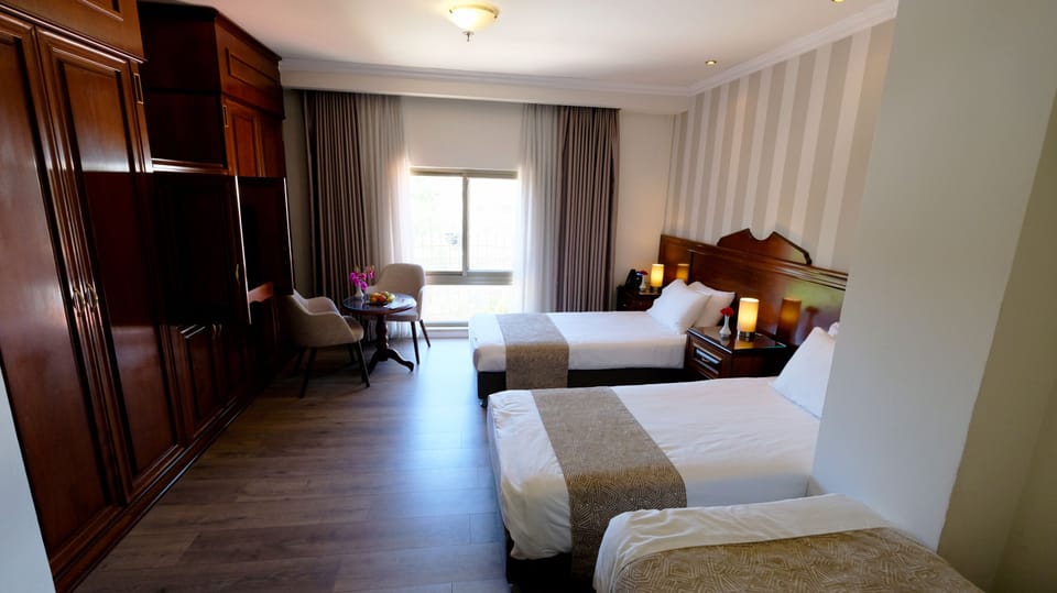 Standard Triple Room, 3 Twin Beds | In-room safe, desk, iron/ironing board, free WiFi