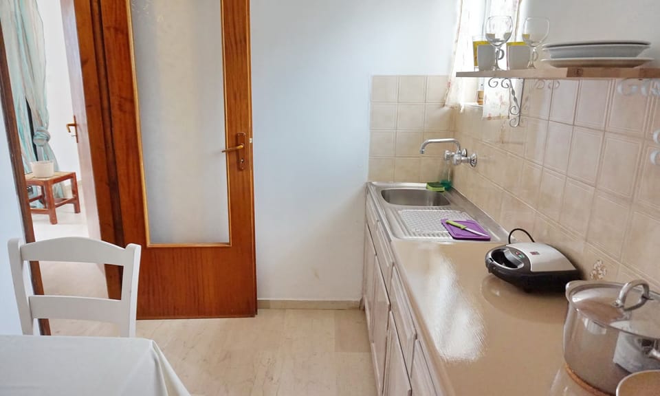 Full-size fridge, stovetop