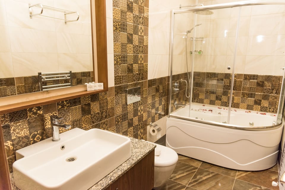 Royal Suite, 2 Bedrooms, River View | Bathroom | Shower, free toiletries, hair dryer, towels