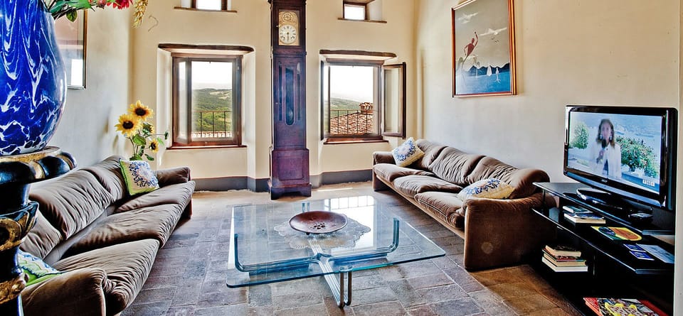 Apartment, 3 Bedrooms | Living room | Flat-screen TV, fireplace