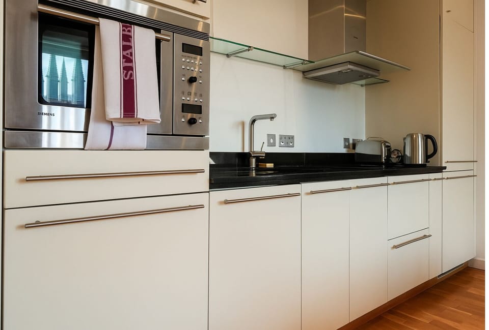 Executive Apartment, 1 Bedroom | Private kitchen | Full-size fridge, microwave, oven, stovetop