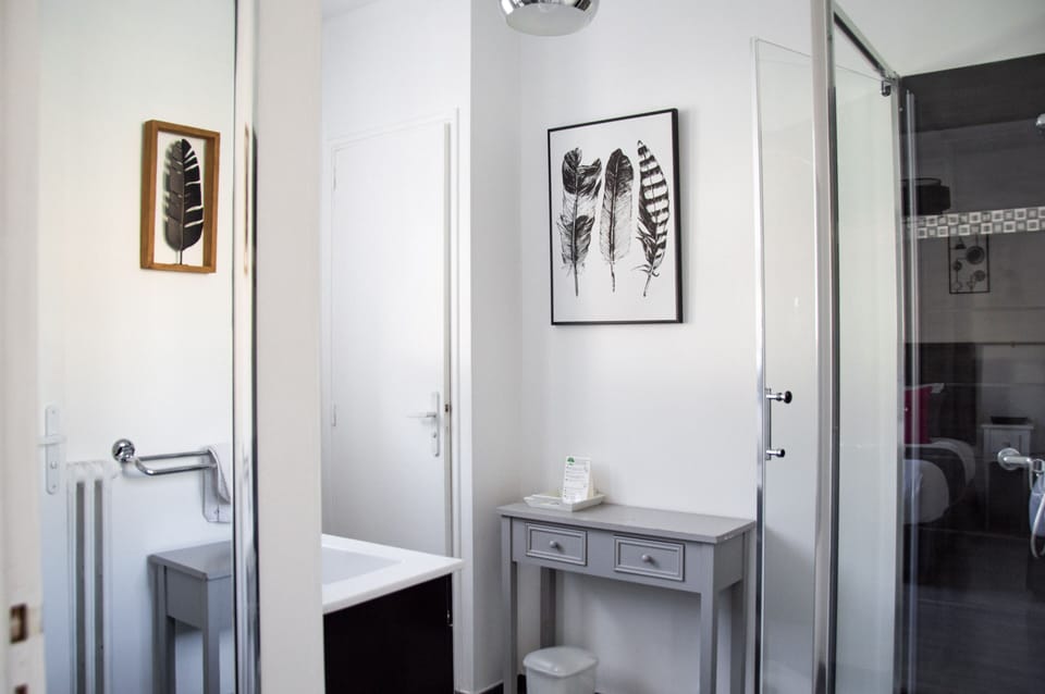 Twin Room | Bathroom | Hair dryer, towels