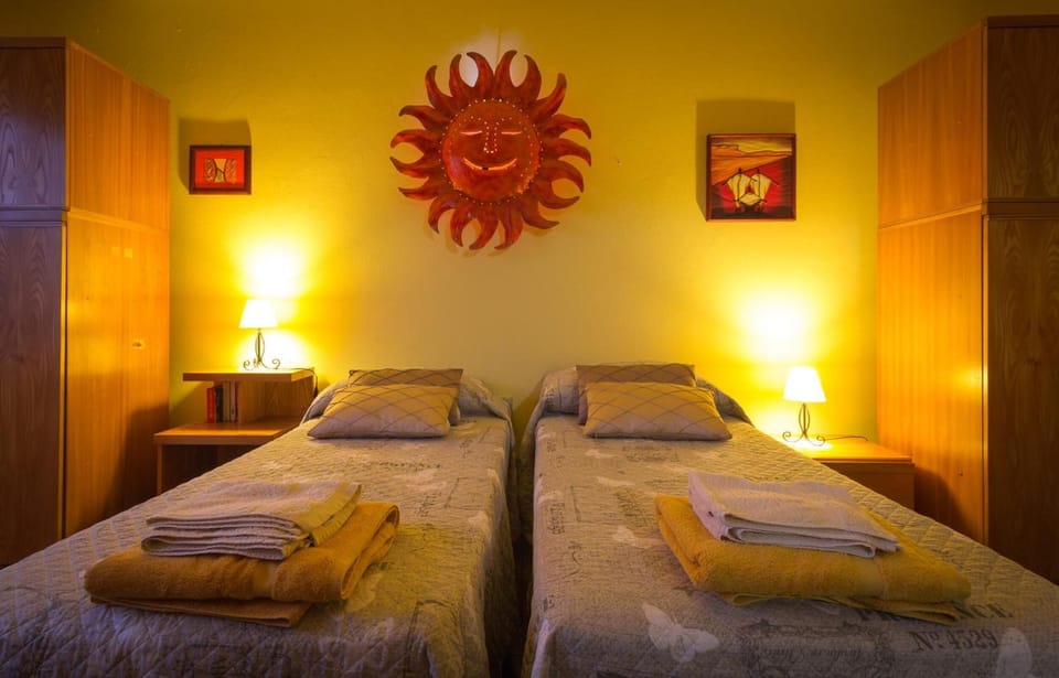 Desk, laptop workspace, free WiFi, bed sheets