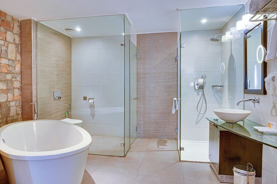 Separate tub and shower, deep soaking tub, free toiletries, hair dryer