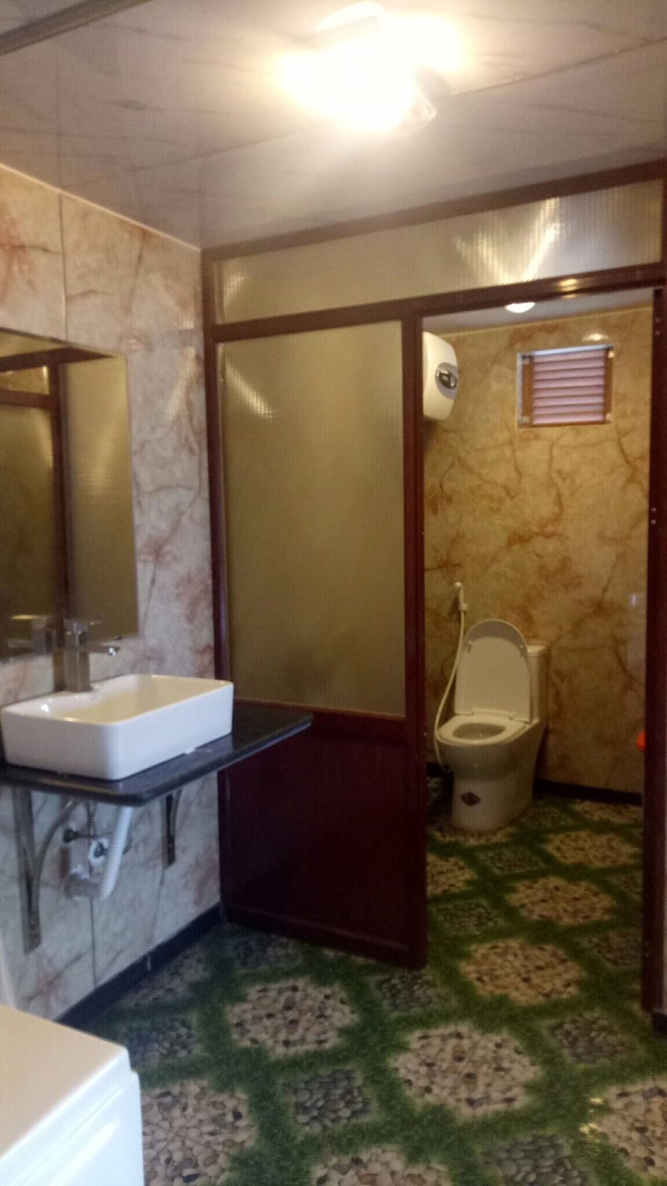Shower, free toiletries, hair dryer, slippers