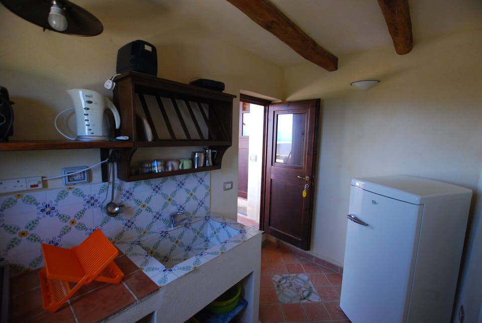 Villa, 1 Bedroom | Private kitchen | Fridge, stovetop, electric kettle, toaster