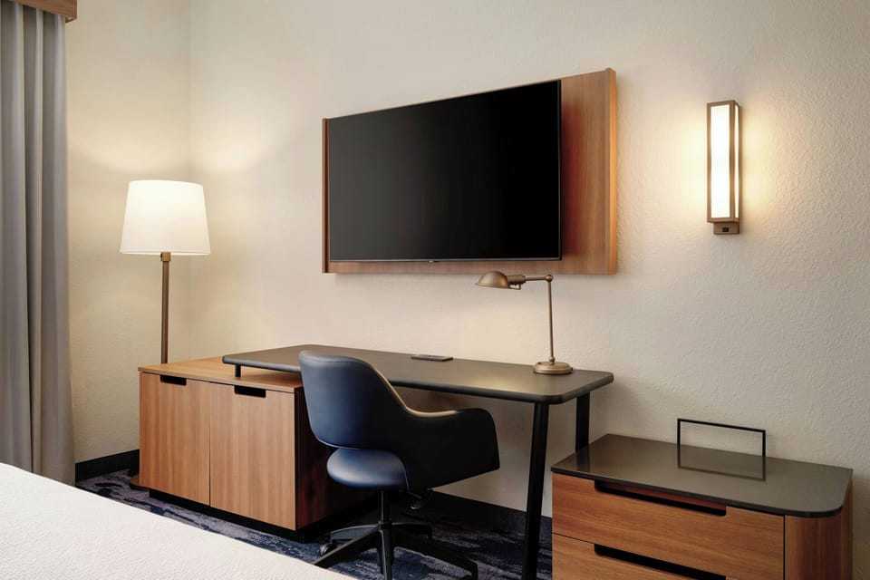 Premium bedding, Tempur-Pedic beds, desk, blackout drapes