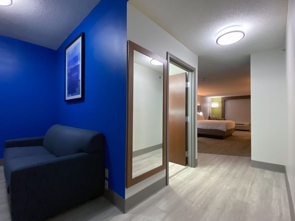 Suite, 1 Bedroom | Desk, laptop workspace, blackout drapes, iron/ironing board