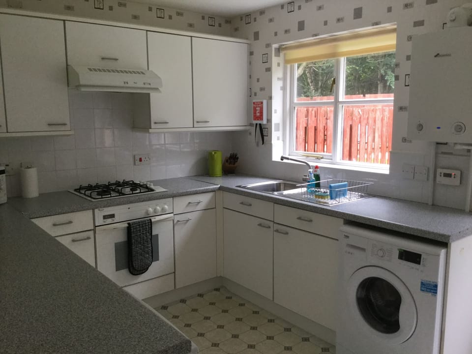 Apartment | Private kitchen | Full-size fridge, microwave, oven, stovetop