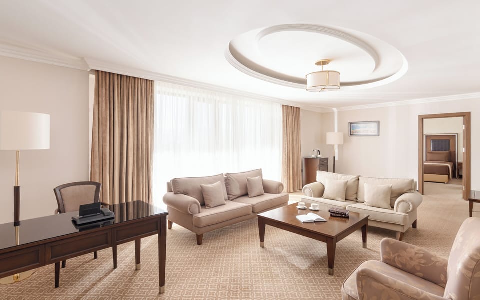 Executive Suite, 1 Bedroom | Living area | LCD TV