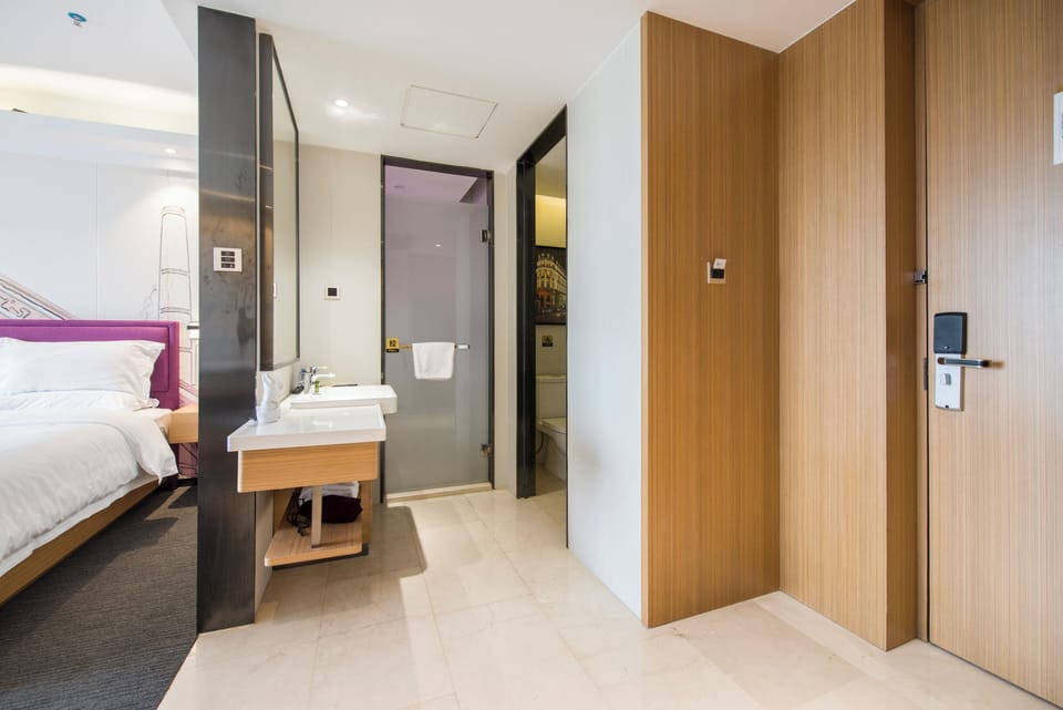 Shower, free toiletries, hair dryer, slippers