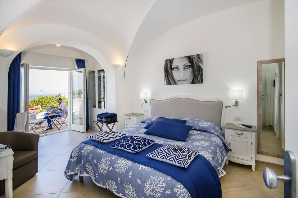 Junior Studio Suite, Sea View | Minibar, in-room safe, desk, soundproofing