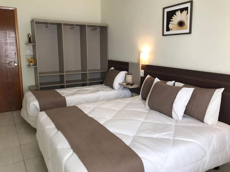Minibar, in-room safe, iron/ironing board, free cribs/infant beds
