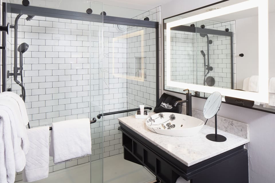 Studio, 1 King Bed | Bathroom | Hair dryer, bathrobes, towels, soap