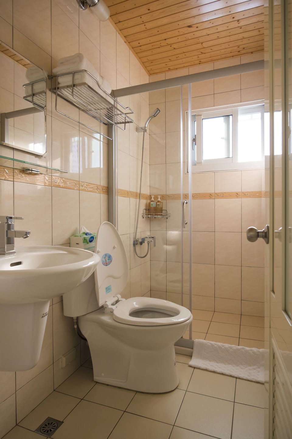 Shower, free toiletries, hair dryer, slippers