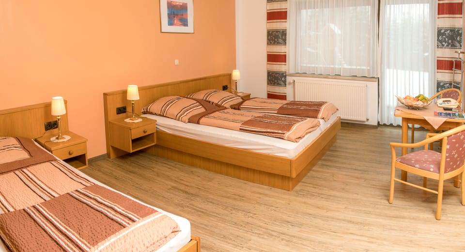Triple Room | 2 bedrooms, in-room safe, blackout drapes, soundproofing