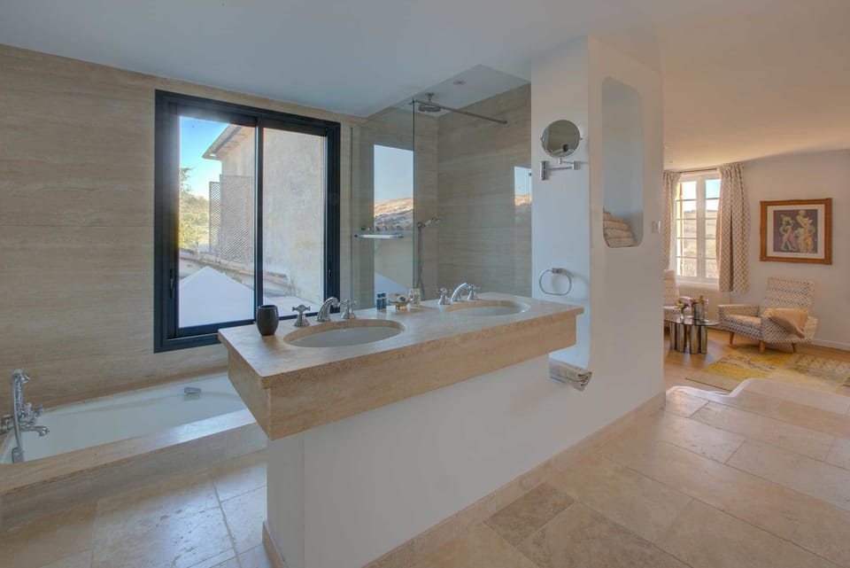 Designer toiletries, hair dryer, bathrobes, slippers