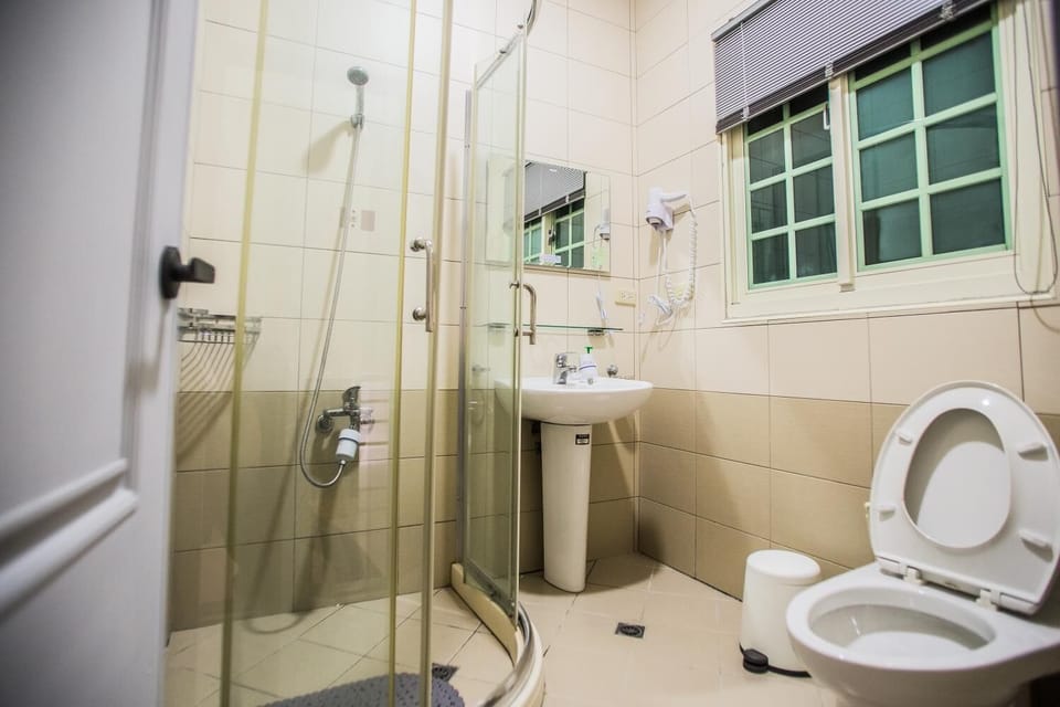 Shower, free toiletries, hair dryer, slippers