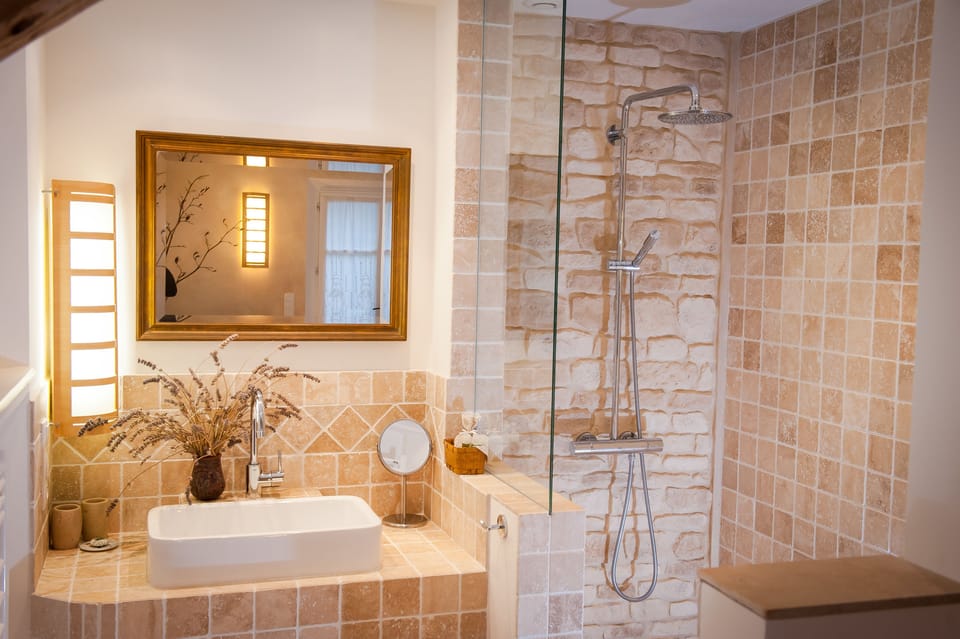 Exclusive Double Room, Garden View (Terre/Eau) | Bathroom | Shower, free toiletries, hair dryer, bathrobes