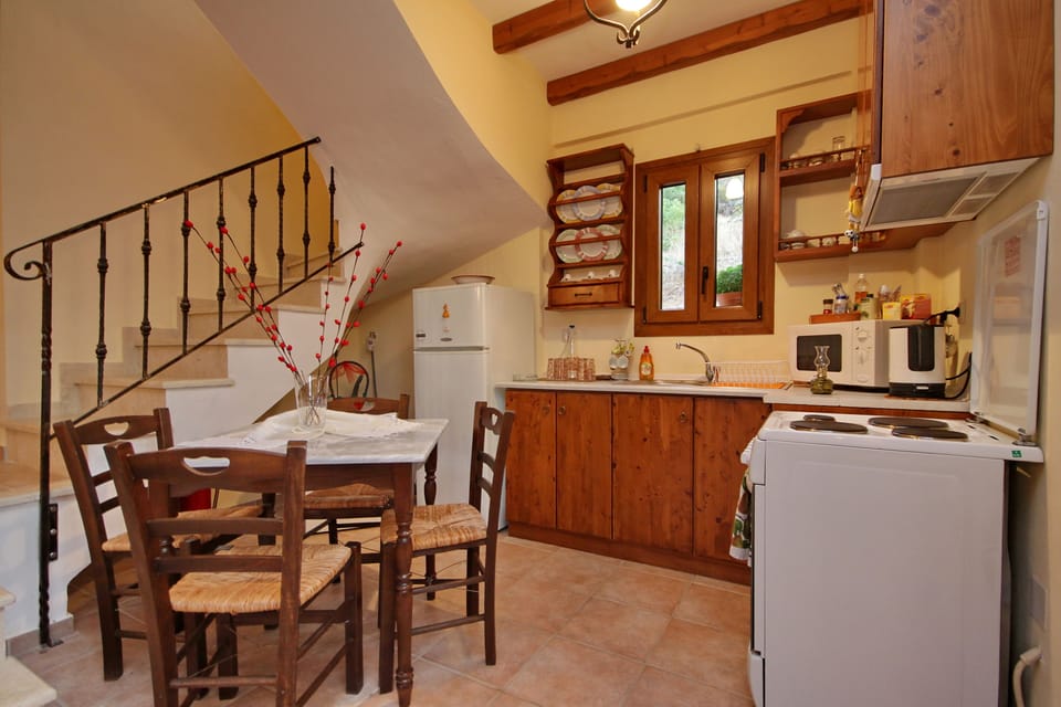 Villa, 2 Bedrooms | Private kitchen | Coffee/tea maker, full-size fridge, oven, stovetop