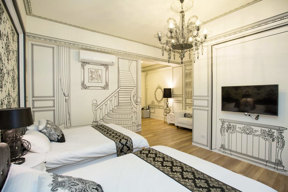 Standard Quadruple Room | Desk, blackout drapes, soundproofing, free WiFi