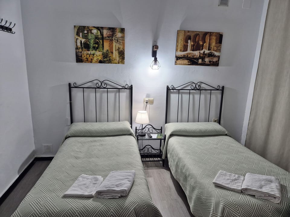 Double or Twin Room, Shared Bathroom | Free WiFi, bed sheets