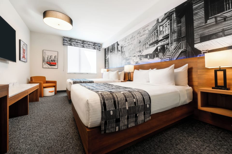 Elevated Queen | Premium bedding, in-room safe, individually decorated
