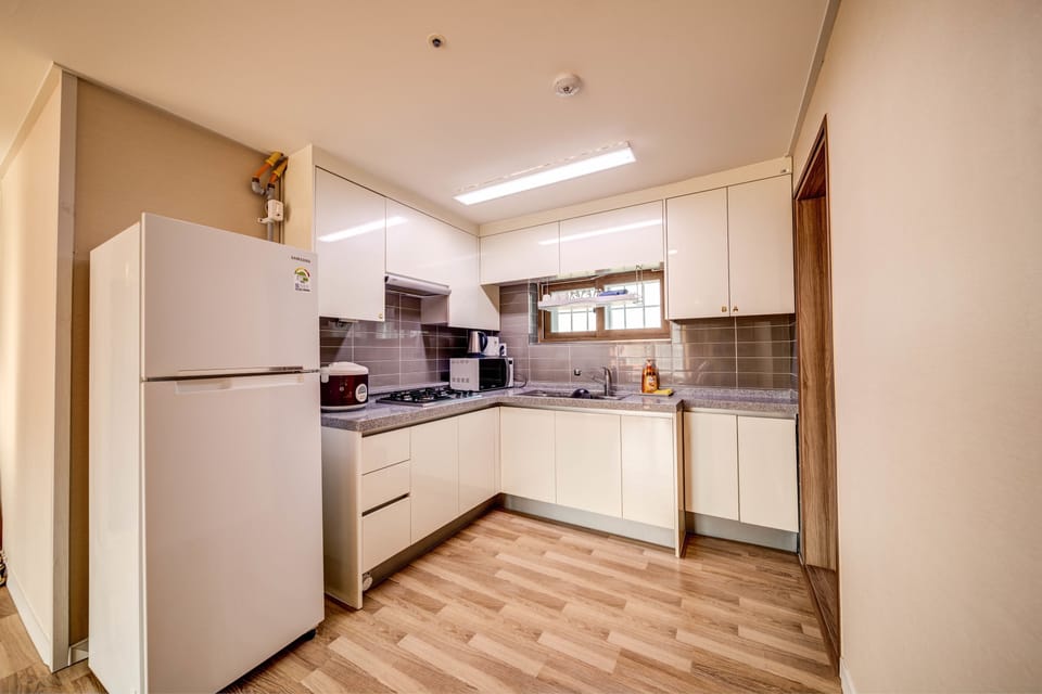 Standard Condo, 3 Bedrooms, Kitchen, Annex Building | Private kitchen | Fridge, microwave, stovetop, coffee/tea maker