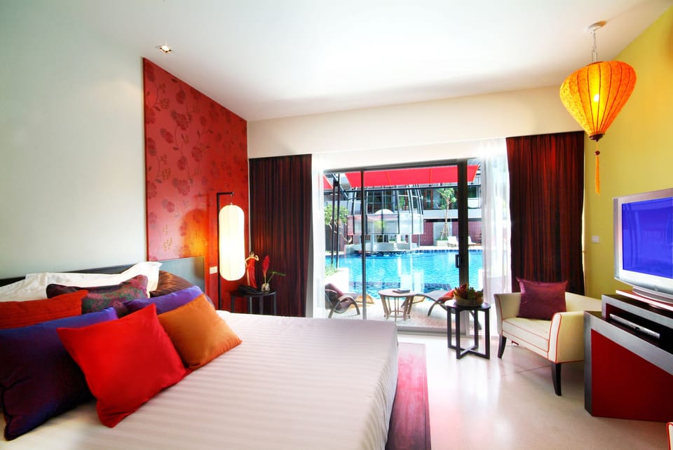 Deluxe Room, Pool Access | 1 bedroom, premium bedding, minibar, in-room safe