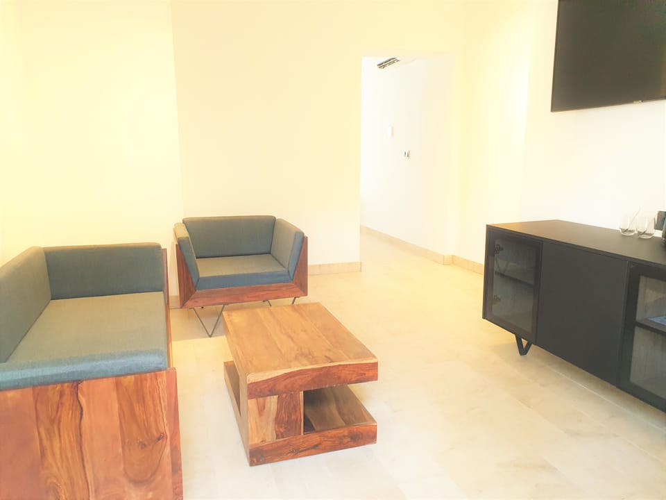 Junior Suite, Garden View | Blackout drapes, soundproofing, WiFi (free), bed sheets
