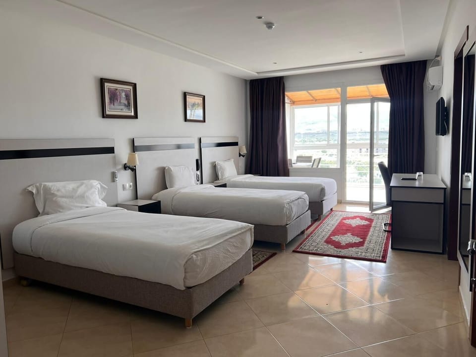 Standard Triple Room | In-room safe, desk, soundproofing, iron/ironing board (on request)