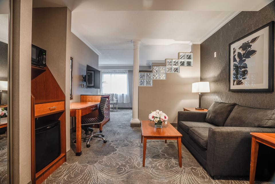 King Suite with Sofa Bed | Down comforters, in-room safe, desk, blackout drapes