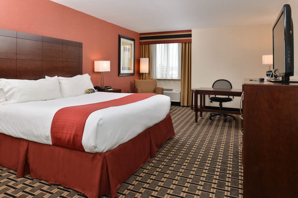 Premium bedding, desk, iron/ironing board, rollaway beds