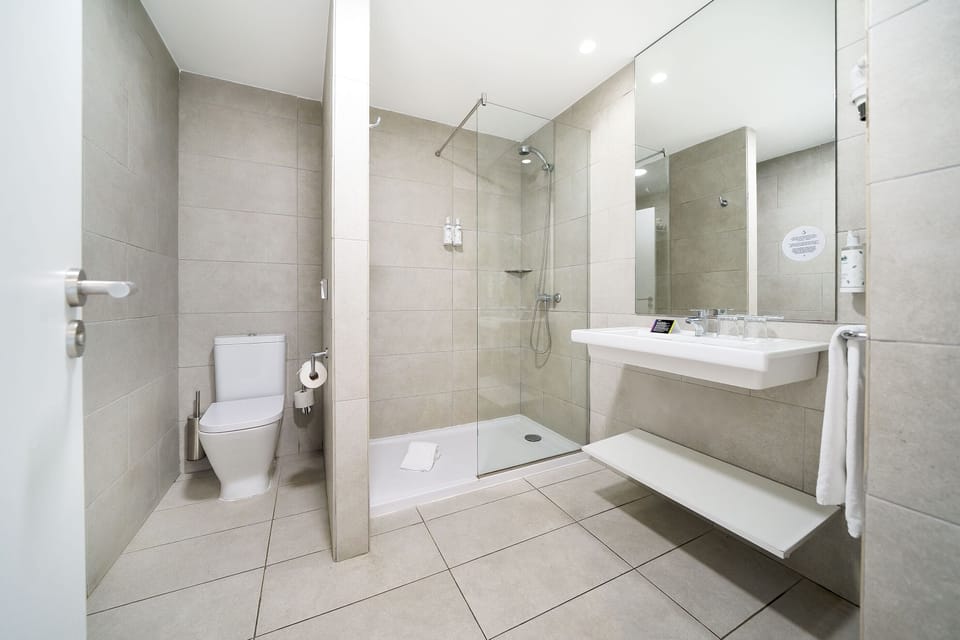 Shower, free toiletries, hair dryer, towels