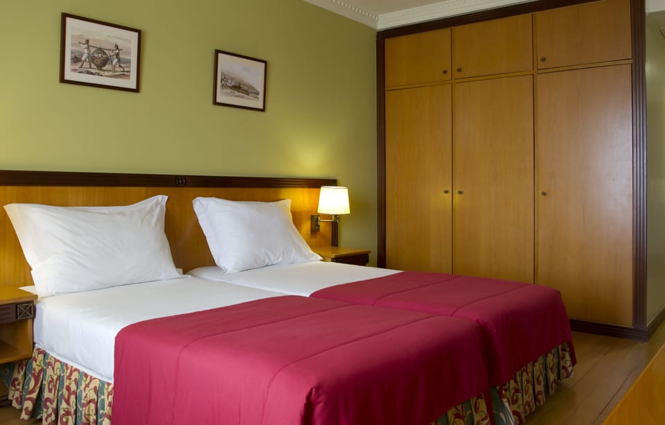 Double or Twin Room, Ocean View | Minibar, in-room safe, desk, blackout drapes