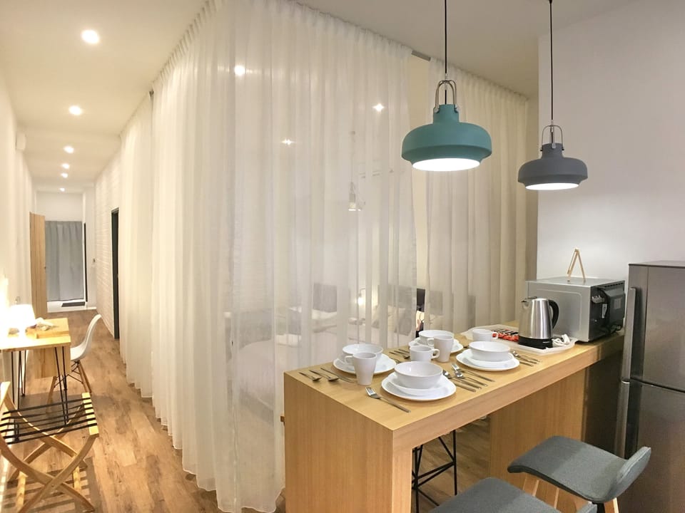 Room, 2 Bedrooms | Living area | Flat-screen TV