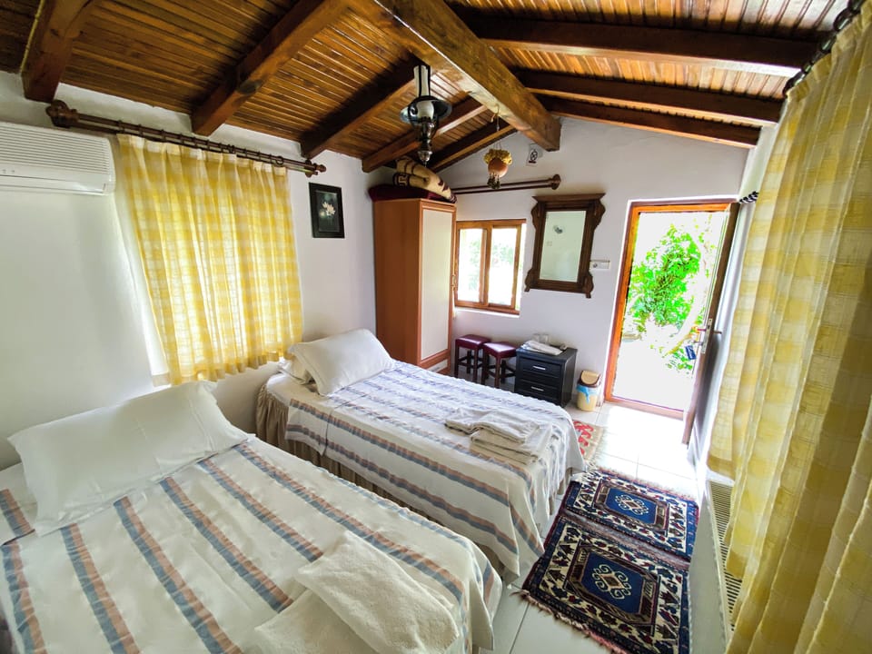 Economy Room, Garden View | Premium bedding, soundproofing, free WiFi, bed sheets