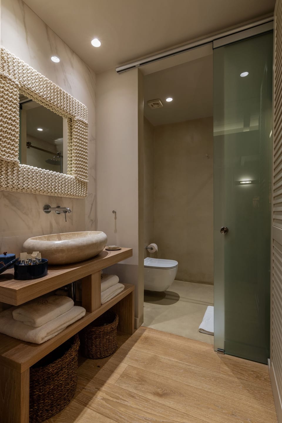 Shower, designer toiletries, hair dryer, bathrobes