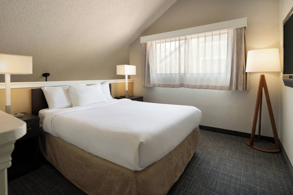 Premium bedding, individually furnished, desk, laptop workspace