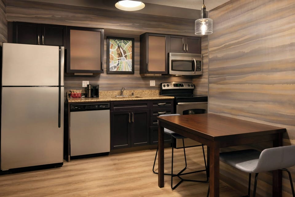 Studio, 1 King Bed with Sofa bed | Private kitchen | Full-size fridge, microwave, stovetop, dishwasher