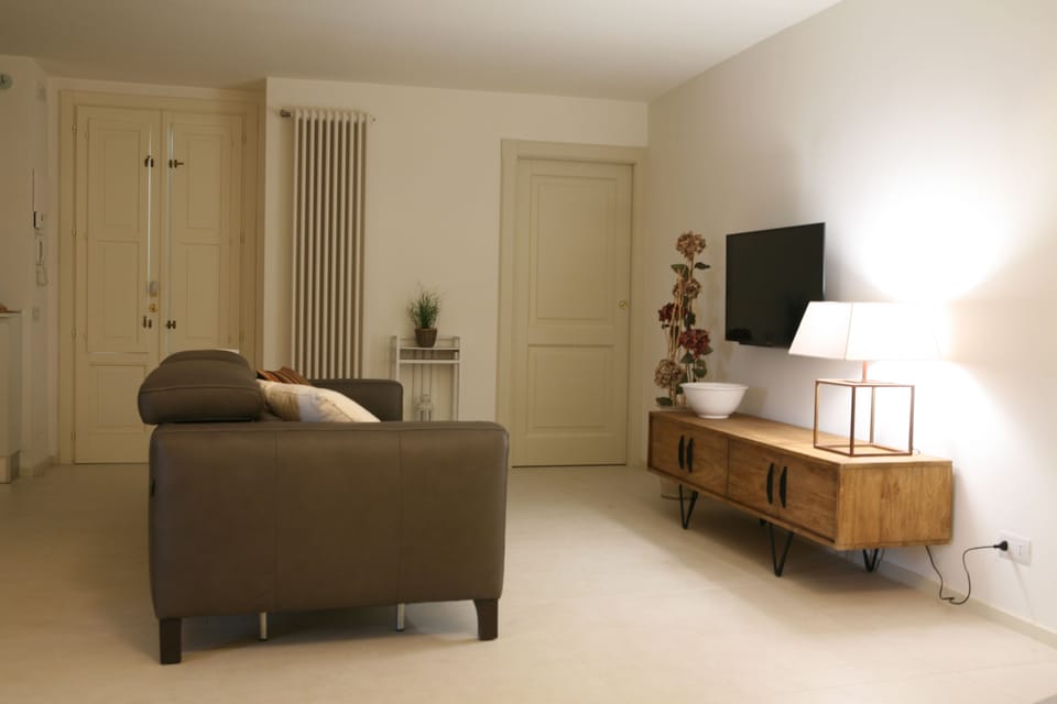 Exclusive Apartment, 1 Bedroom, City View | Living area | Flat-screen TV