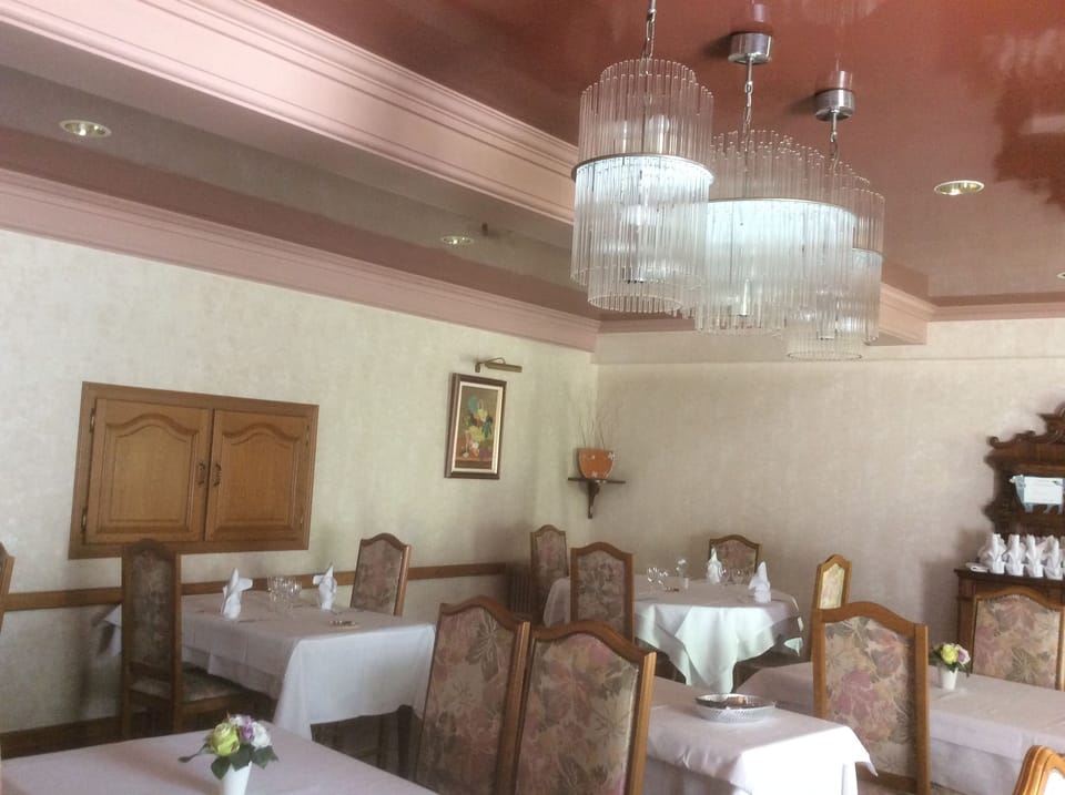 Lunch and dinner served, local cuisine