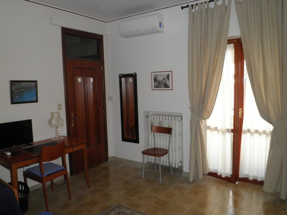 Desk, blackout drapes, WiFi (free), bed sheets