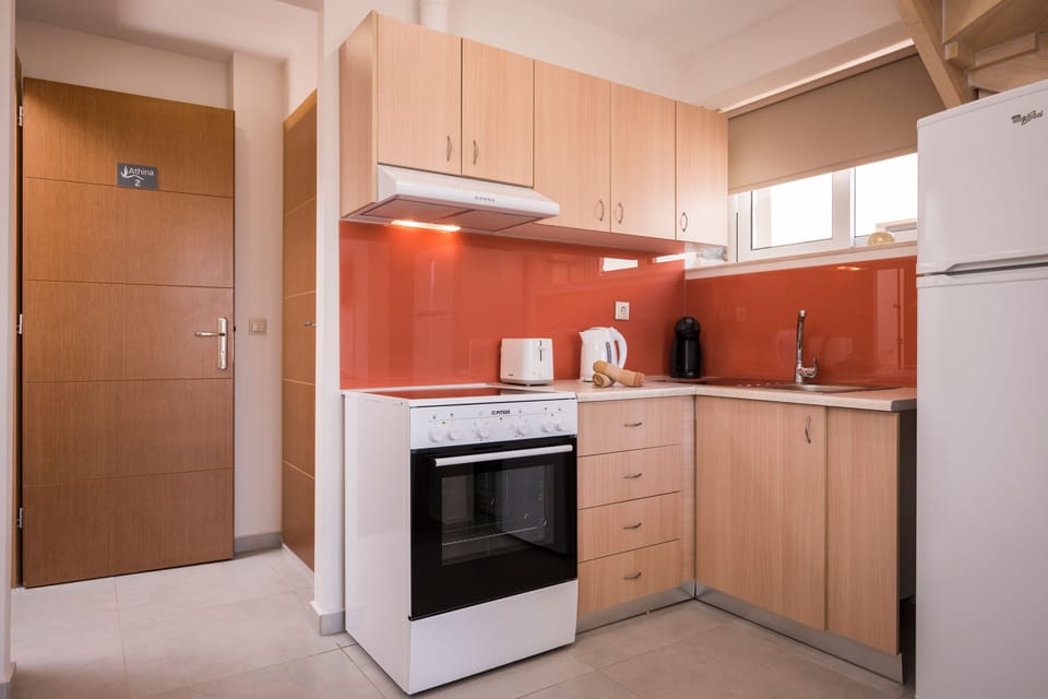 Apartment, 2 Bedrooms, Balcony, Sea View | Private kitchenette | Fridge, oven, stovetop, coffee/tea maker