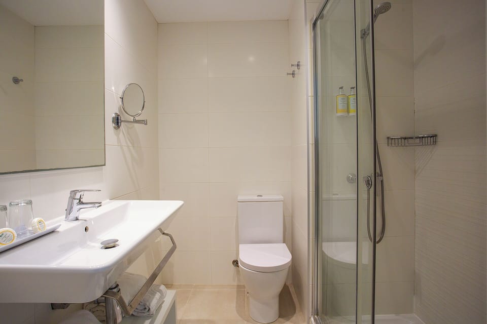 Double or Twin Room, Balcony | Bathroom | Shower, designer toiletries, hair dryer, towels