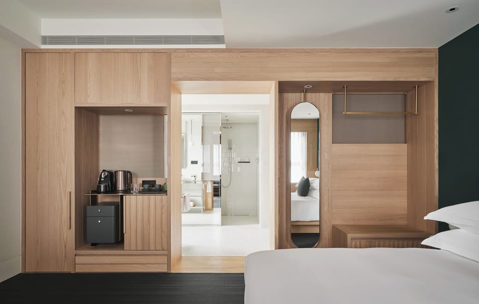 Premium bedding, down comforters, minibar, in-room safe