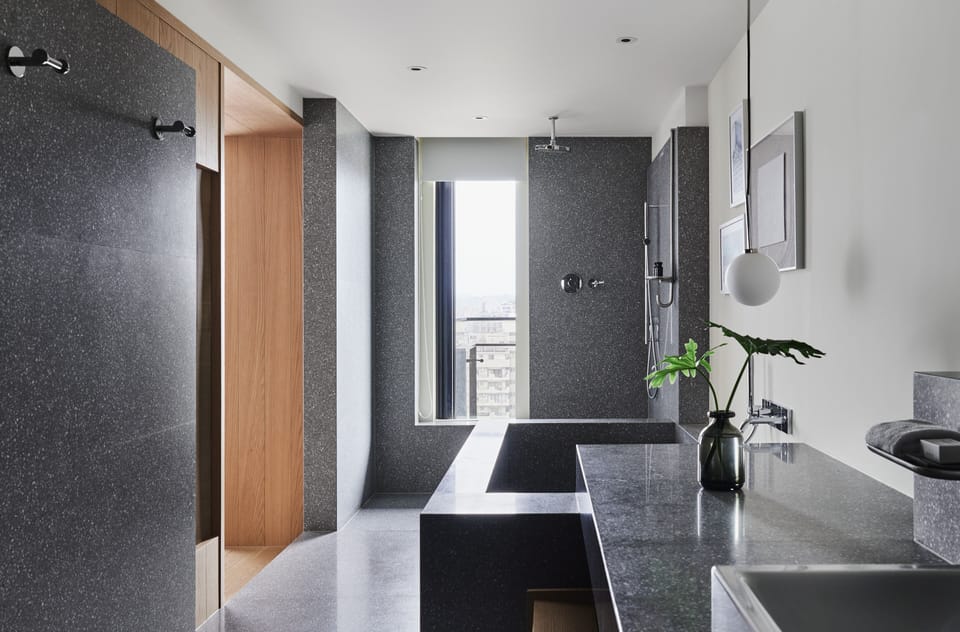 Suite, 1 King Bed, City View | Bathroom | Designer toiletries, hair dryer, bathrobes, slippers