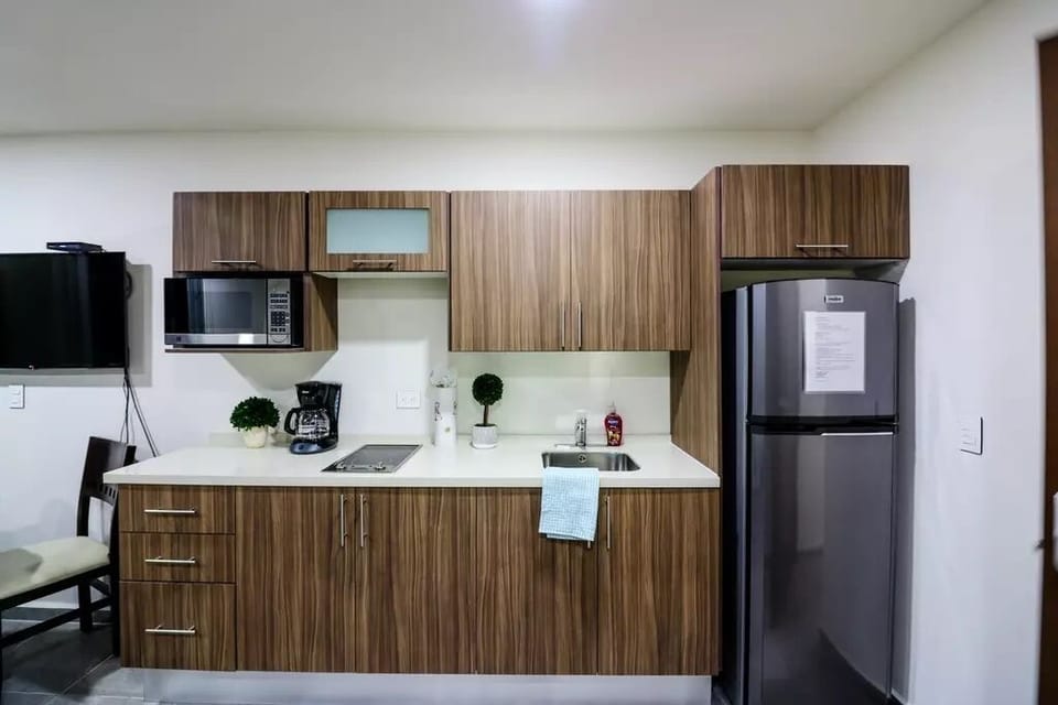 Family Condo, 2 Bedrooms | Private kitchen | Fridge, microwave