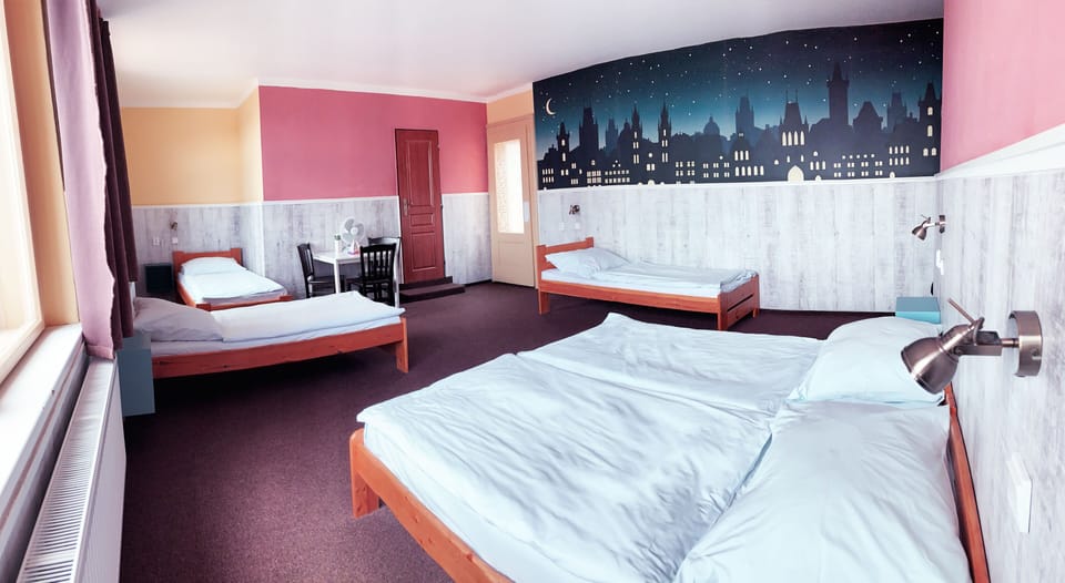 Standard Room, Multiple Beds (5 guests) | Desk, blackout drapes, soundproofing, iron/ironing board