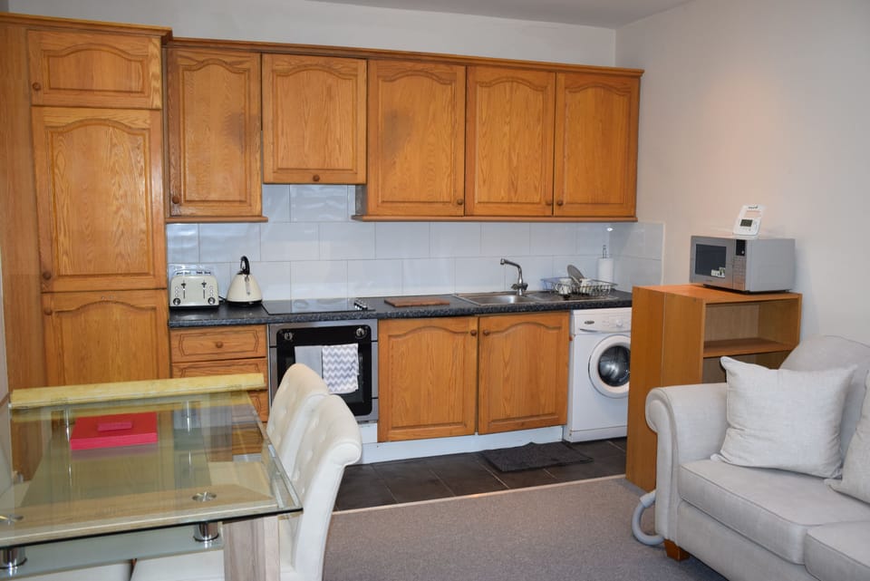 Deluxe Apartment, 2 Bedrooms | Private kitchen | Full-size fridge, microwave, oven, stovetop